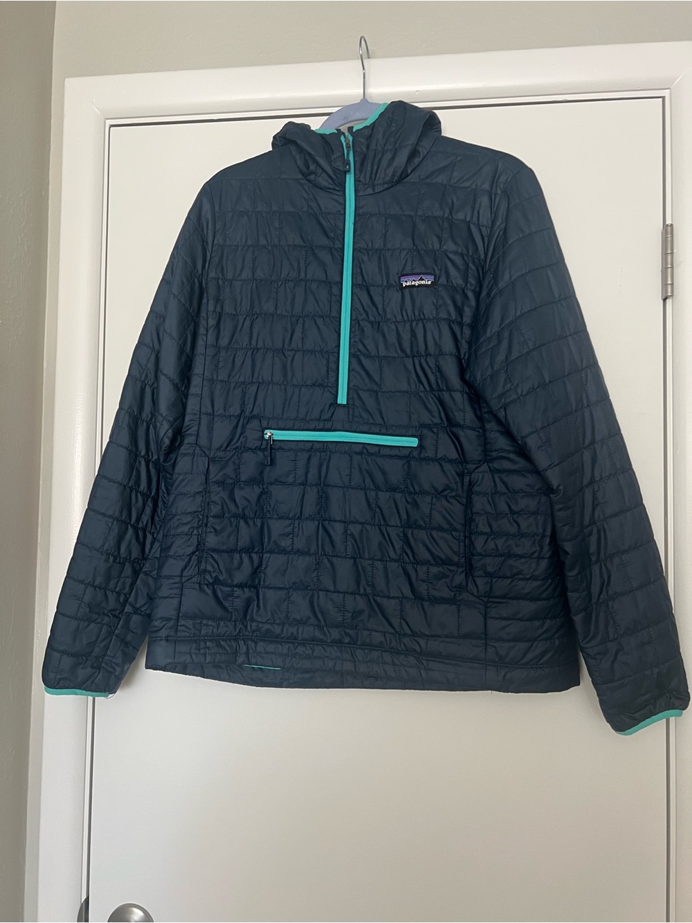 Patagonia Women’s Dark Navy Quilted Pullover with Teal Accents
